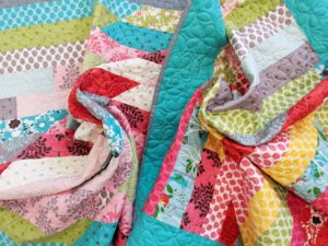 Exponential (the it’s a hoot momo baby ones) – slightly biased quilts